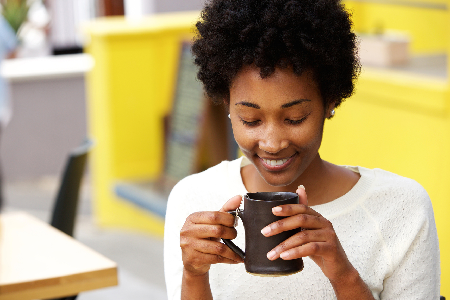 Happy Young Black Woman Drinking Coffee